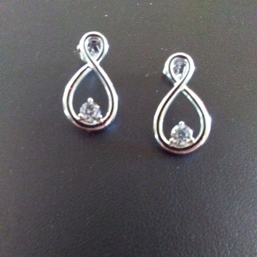 Avon silver tone and Cubic Zirconium Catia Eternity earrings